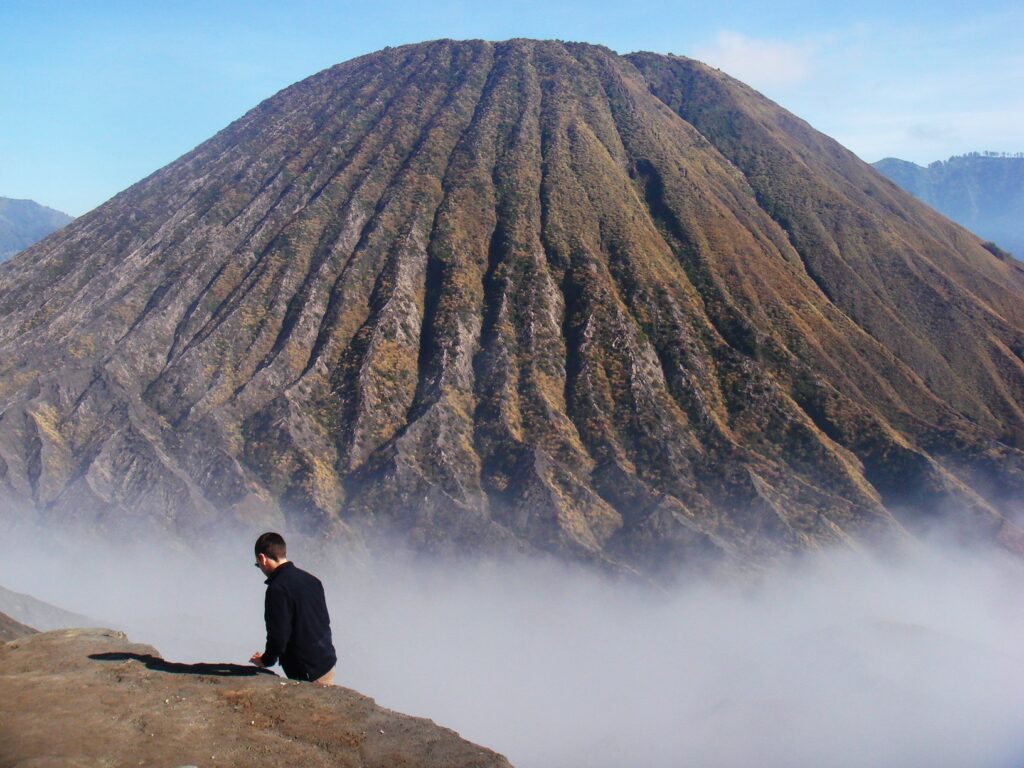 Hiking Mount Bromo active volcano in Indonesia.