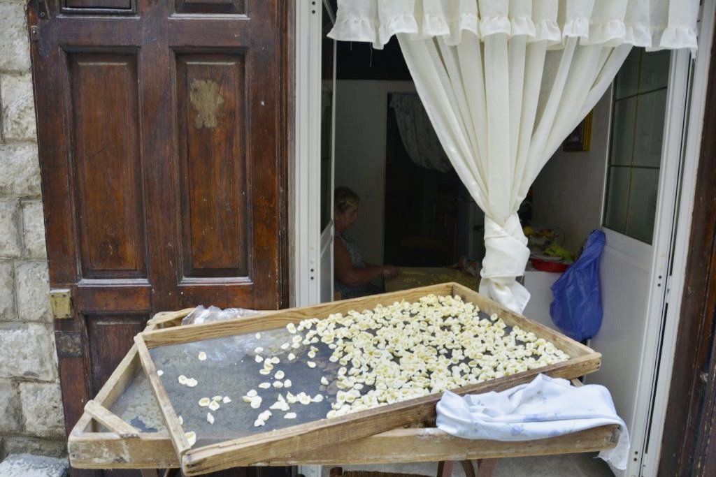 women making ravioli in Puglia