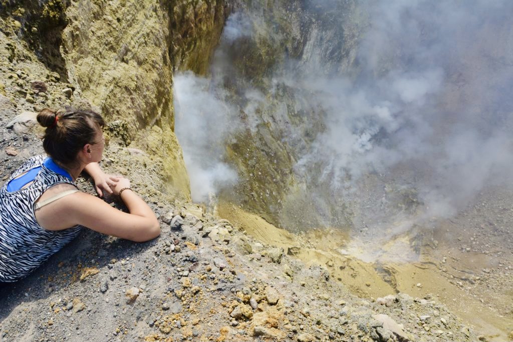 Woman looking inside Telica Volcano crater