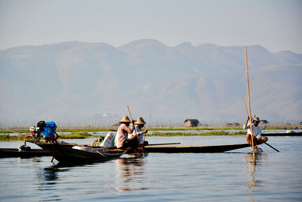 Fishermen on a boats on Inle lake