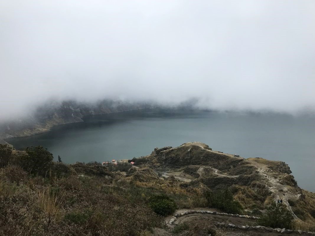 Hiking Quilotoa Loop in Ecuador – trail toward lagoon crater lake.